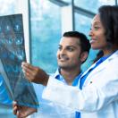 Healthcare workers looking at an X-ray