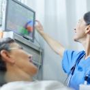 Healthcare worker checking patient's vitals