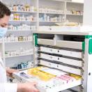 Pharmacist sorting medication