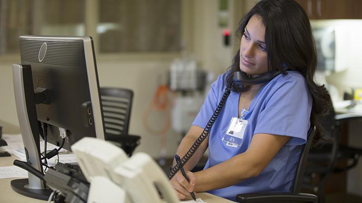 hospital nurse on phone with patient