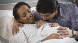 Parents with newborn baby